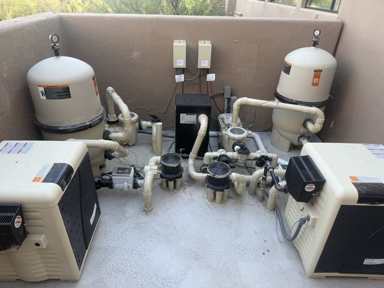 A clean, modern Pentair equipment pad after Providence Pool Care's upgrade